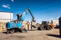 Fuchs Umschlag Bagger und Hitachi Radlader